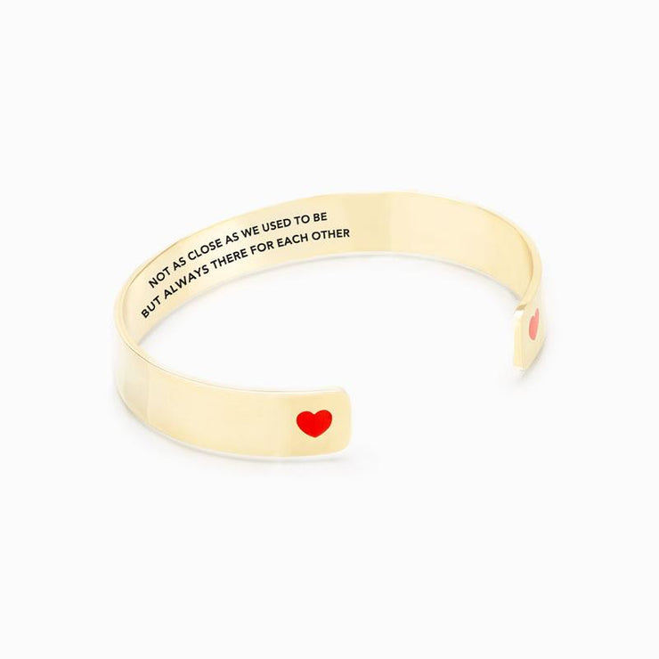 Not as close as we used to be but always there for each other heart bangle